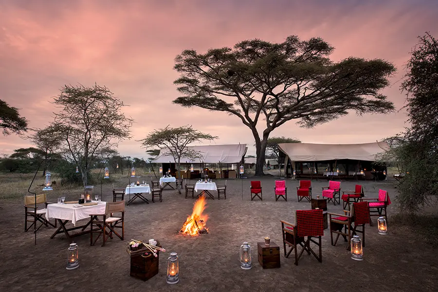 Around-the-fire-andBeyond-Serengeti-Under-Canvas