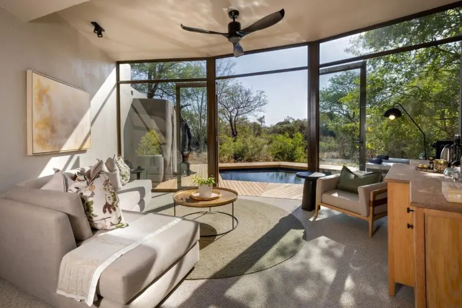 A Sabi Sabi Bush Lodge Suite overlooks its very own private plunge pool with views of the wild