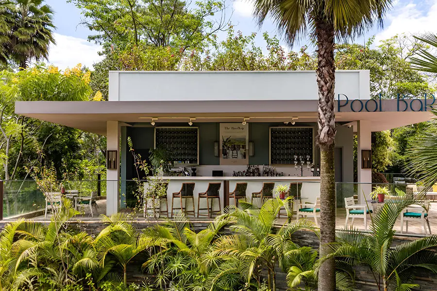 Enjoy drinks at the pool bar. 