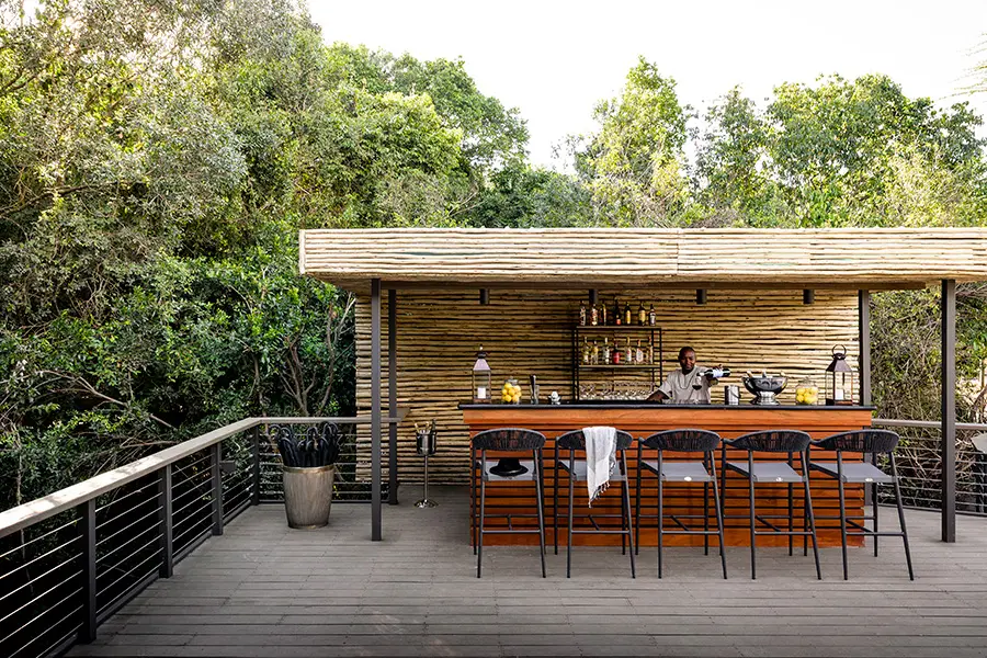 Enjoy a drink from the bar.