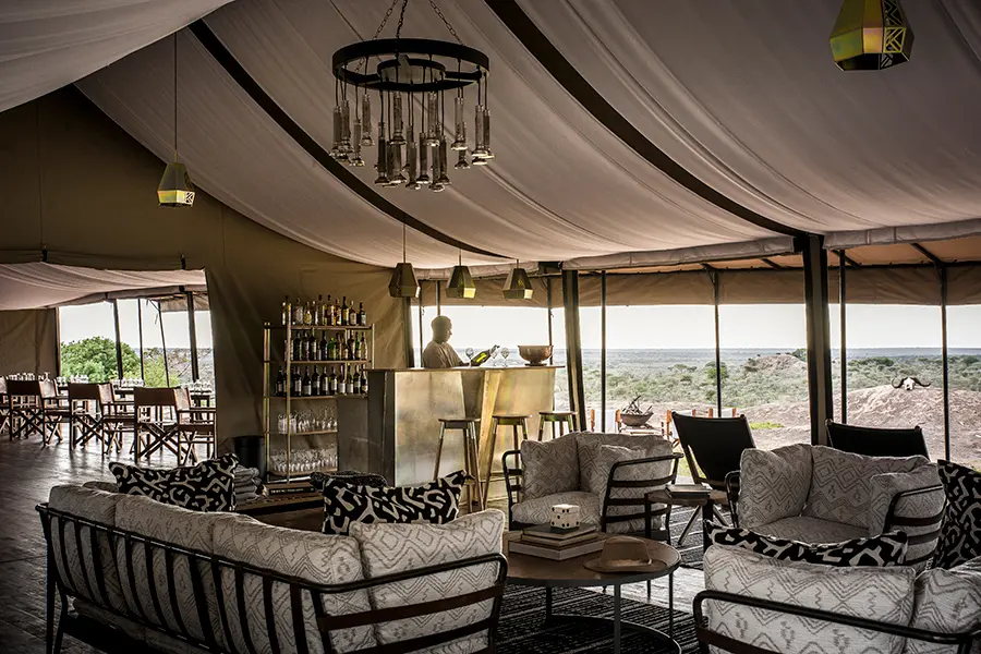 The lounge offers expansive views of the Serengeti.